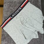 شورت نیم‌پا Lacoste یاشن کد ۰۶۴ | ۱۰۰٪ مودال | کش مشکی